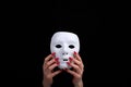 A white mask is a symbol of duplicity and false people