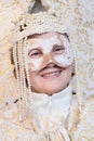 White masked lady during the Carnival of Venice