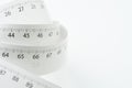 White measurement tape roll with number of centimeter and inch i Royalty Free Stock Photo