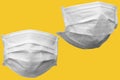 white medical face mask isolated on yellow background with clipping path Royalty Free Stock Photo