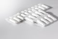 White Medical Suppositories in Blister strip - pills on white background