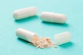 White medicine capsules probiotic powder inside. Close up. High resolution product. Health care concept - Image Royalty Free Stock Photo