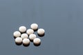 White Medicine Pills isolated on Glass Background Royalty Free Stock Photo