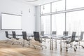 White meeting room with projection screen Royalty Free Stock Photo