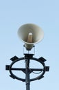 White megaphone on the old pole Royalty Free Stock Photo