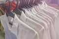 White men`s shirts on hangers Royalty Free Stock Photo