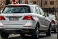 White Mercedes back view suv in traffic in Bucharest, Romania, 2021