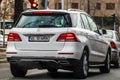 White Mercedes back view suv in traffic in Bucharest, Romania, 2021
