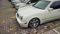 White Mercedes Benz E320 W210 on parking lot Royalty Free Stock Photo