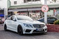 White Mercedes Benz model W207, E Coupe, W211 based with tuning on Street in Kemer