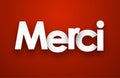 Paper merci sign.