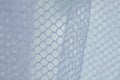 White mesh fabric textured background. mesh with large holes