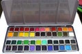 White metal box with watercolors palette