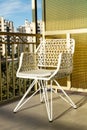 A white metal chair in a balcony Royalty Free Stock Photo