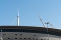 White metal construction on the roof of the stadium against the blue sky Royalty Free Stock Photo