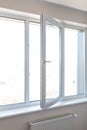 White metal-plastic windows of balcony in modern apartment Royalty Free Stock Photo