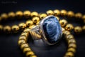 White metal ring with big blue stone gold beads Royalty Free Stock Photo