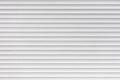 White metal roller shutter door texture background. Texture of white metal roller shutter door Royalty Free Stock Photo