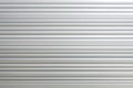 White metal roller shutter door texture background for graphic design or wallpaper Royalty Free Stock Photo