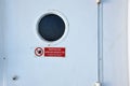 White metal weather tight exit door from superstructure of cargo merchant container vessel