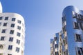 White and metallic houses with blue windows, modern architecture