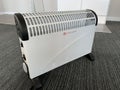 White metallic portable electric heater