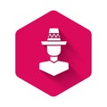 White Mexican man wearing sombrero icon isolated with long shadow background. Hispanic man with a mustache. Pink hexagon