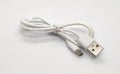 White micro USB charger cable isolated on white background Royalty Free Stock Photo