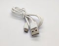 White micro USB charger cable isolated on white background Royalty Free Stock Photo