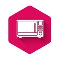 White Microwave oven icon isolated with long shadow. Home appliances icon. Pink hexagon button. Vector Illustration Royalty Free Stock Photo