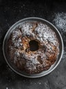 White and milk chocolate banana oatmeal cake on a dark table background, top view. Delicious breakfast, snack, dessert Royalty Free Stock Photo