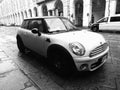 white Mini car in Turin in black and white Royalty Free Stock Photo