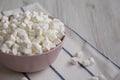 White Mini Marshmallows in a Pink Bowl, side view. Copy space Royalty Free Stock Photo