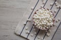 White Mini Marshmallows in a Pink Bowl, top view. Flat lay, overhead, from above. Space for text Royalty Free Stock Photo