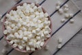 White Mini Marshmallows in a Pink Bowl, top view. Flat lay, overhead, from above Royalty Free Stock Photo