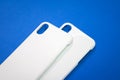 White mobile case on blue background. Smart phone cover for your design Royalty Free Stock Photo