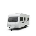 White mobile home trailer with two axles and sleek, modern design. Features large Royalty Free Stock Photo