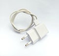 White mobile phone charger isolated on white background. White mobile phone charger isolated on white background. Fast charging. Royalty Free Stock Photo