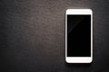 White mobile smartphone on luxury black background Royalty Free Stock Photo