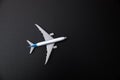 White model airplane on black background Royalty Free Stock Photo