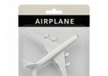A white model airplane in its retail packaging, isolated on white background Royalty Free Stock Photo