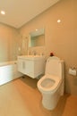 A White Modern bathroom in a condominium, interior deisgn