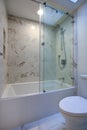 White modern bathroom with marble shower Royalty Free Stock Photo