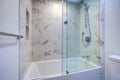 White modern bathroom with marble shower Royalty Free Stock Photo