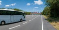 White Modern comfortable tourist bus driving through highway to Disneyland. Royalty Free Stock Photo
