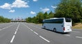 White Modern comfortable tourist bus driving through highway to Disneyland.