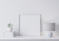 White modern frame mock up in modern interior, close up for white lamp, books and green plant on shelf,