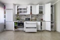 White modern kitchen interior, some drawers pulled out Royalty Free Stock Photo