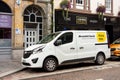 White modern Renault van hired from the Arnold Clark car rental company parked at the street in Scottish town