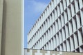 White modern stone building against the blue sky Royalty Free Stock Photo